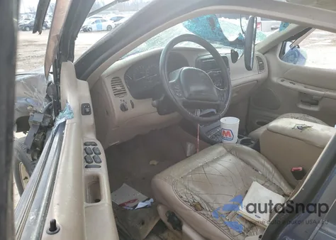 1999 Ford Explorer из США, поврежденный, VIN 1FMZU35P0XZB77099